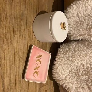 jewelry dish , and a cute container to keep things in/decorations